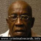 JAMES T HOLMES