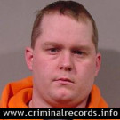 JUSTIN M SCROGGS